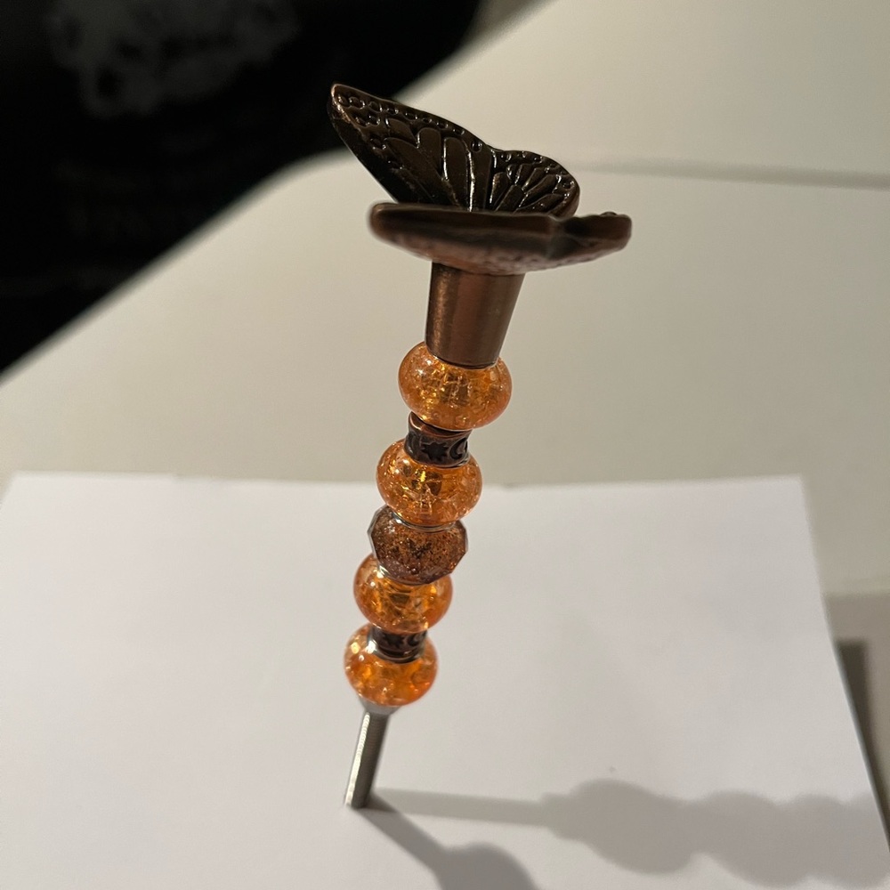 Decorative Orange Beaded plant stick. Handmade